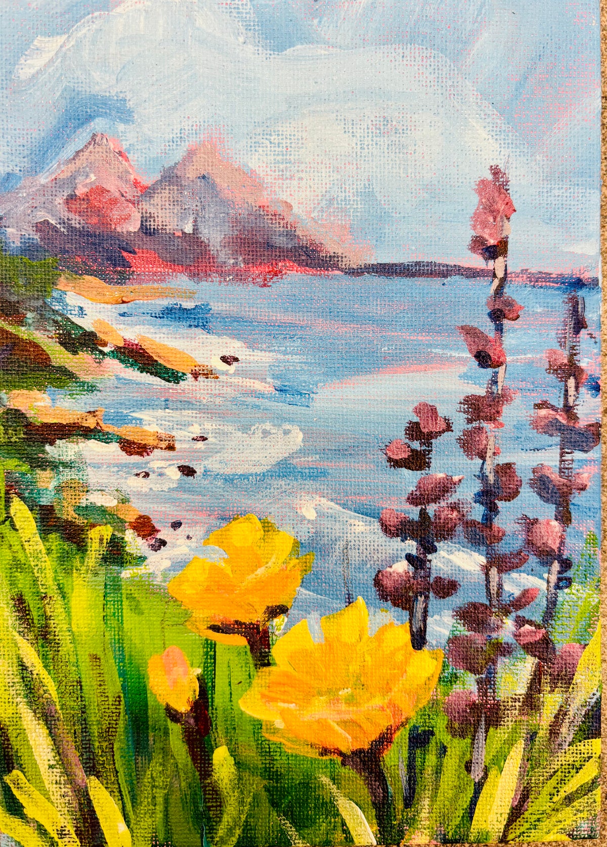 Coastal painting with yellow wildflowers, purple blooms, blue water, and distant mountains