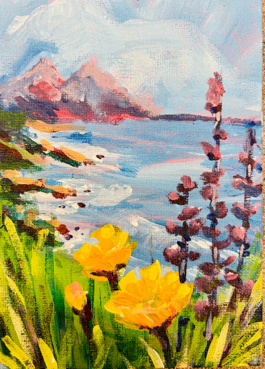 Coastal painting with yellow wildflowers, purple blooms, blue water, and distant mountains